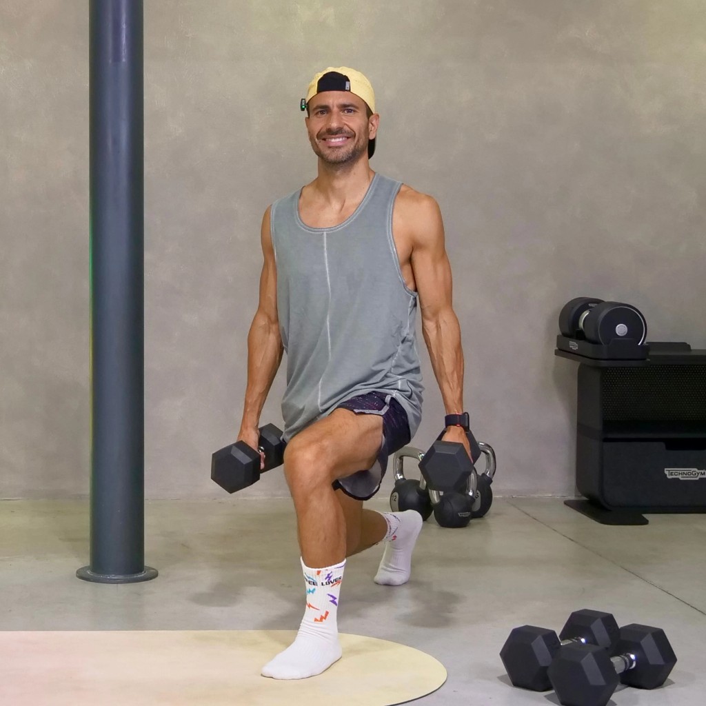Allenamento PHA Body Reset: affondo con manubri